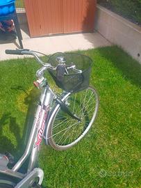 Bicicletta da donna con seggiolino