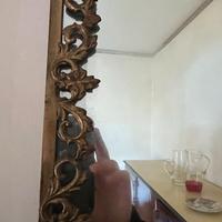 Specchio con cornice barocca in ferro