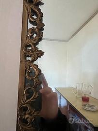 Specchio con cornice barocca in ferro