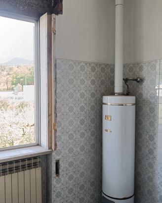 Boiler dell' acqua calda a legna