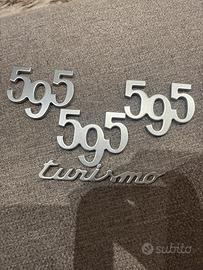 Loghi 595 turismo Originali in colorazione argento