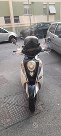 Sym mio 100
