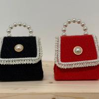 Borsetta elegante con manico di perle - disponibil