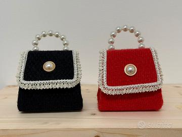 Borsetta elegante con manico di perle - disponibil