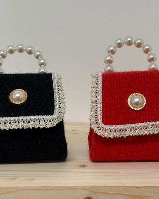 Borsetta elegante con manico di perle - disponibil