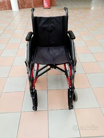 Carrozzina pieghevole