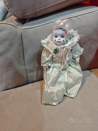 bambola in porcellana pagliaccio 