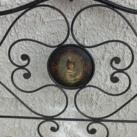 Antico letto in ferro battuto