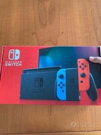 Nintendo Switch+5 giochi+custodia+dock originale