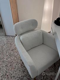 Poltrona bianca in tessuto bouclé