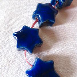 Perle ceramica raku a forma di stella, blu cobalto