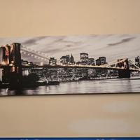 Quadro su tela 40×125 cm – New York notturna con B