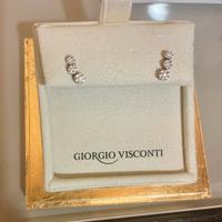 Orecchini trilogy scalare in oro bianco e diamante