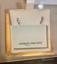 Orecchini trilogy scalare in oro bianco e diamante