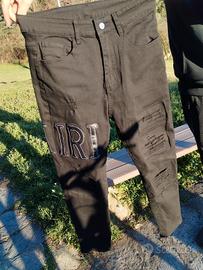 Jeans AMIRI Skinny Fit Neri Dettagli Strappati 