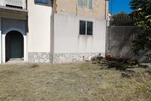 Porzione fabbricato da completare + terreno