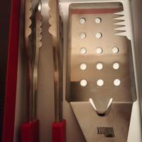 coppia di utensili da cucina manico rosso