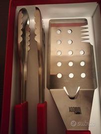 coppia di utensili da cucina manico rosso