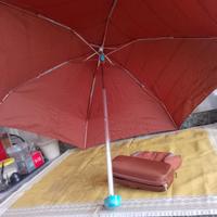 Ombrello marchio PIQUADRO. 