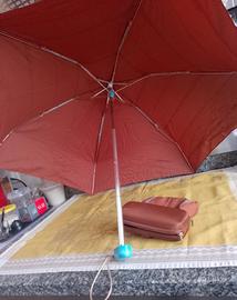 Ombrello marchio PIQUADRO. 