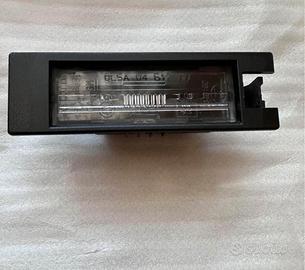 GM 13251936 luce targa originale per Opel Corsa D