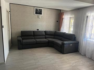 Divano angolare con letto