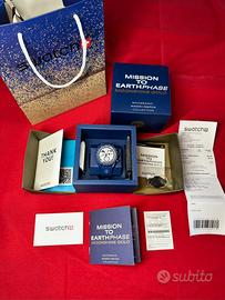 Omega xSwatch Mission to EarthPhase Moonshine Gold