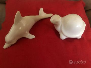 Delfino e tartaruga in ceramica bianca
