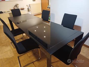 Tavolo nero in vetro allungabile + sedie 
