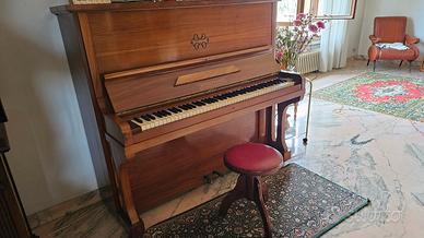 pianoforte verticale con seggiolino