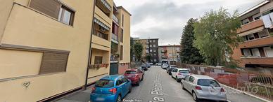 Bilocale con giardino privato e posto auto a Monza