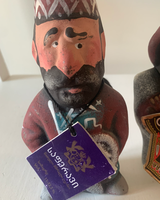 Coppia bottiglie figurali georgiane in ceramica