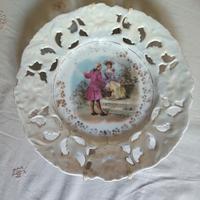 piatto in porcellana con bordo traforato 