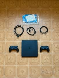 Ps4 slim + 2 controller + 15 giochi