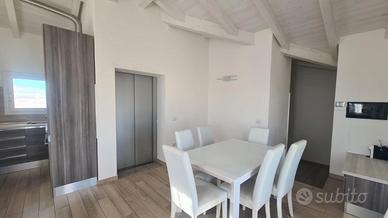 Elegante attico centro Budoni vista mare