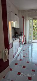 Camere singole in ampio appartamento