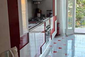 Camere singole in ampio appartamento