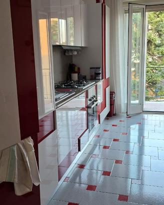 Camere singole in ampio appartamento