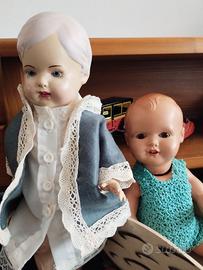 Bambola Schildkrot e Cellba e carrettino in legno