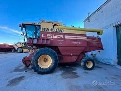 Mietitrebbia New Holland L 523 con barra grano