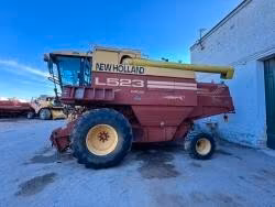 Mietitrebbia New Holland L 523 con barra grano