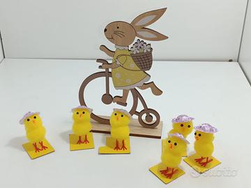 Pulcini e coniglietto in bici