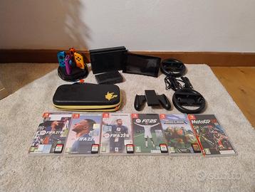 Nintendo switch 1 con molti gadget e giochi