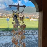 Lampadario artigianale con conchiglie