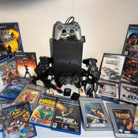 PS2+manuale+giochi+4 joystick+2 memory card