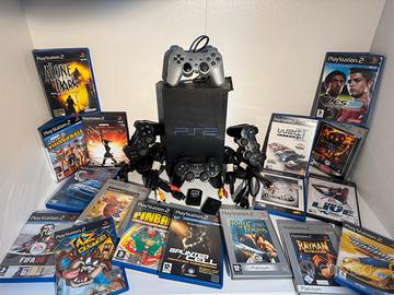 PS2+manuale+giochi+4 joystick+2 memory card