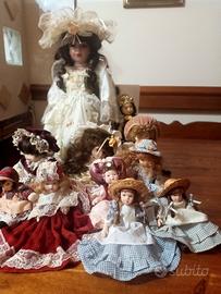 12  bambole di porcellana da collezione 