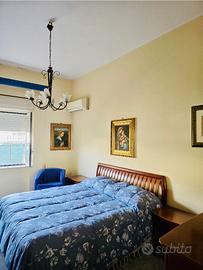 Camera da letto e lampadario