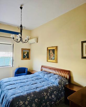 Camera da letto e lampadario