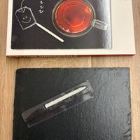 Piatto in ardesia con penna Giannini